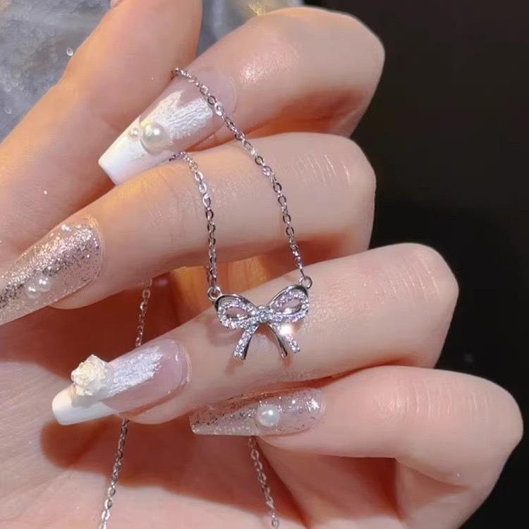 Bow necklace Women's light luxury niche design sense Clavicle chain Simple temperament Diamond-encrusted zircon pendant jewelry