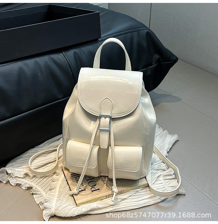 

2025 new student soft surface schoolbag Korean version large capacity versatile pu backpack fashionable and convenient travel backpack tide белый