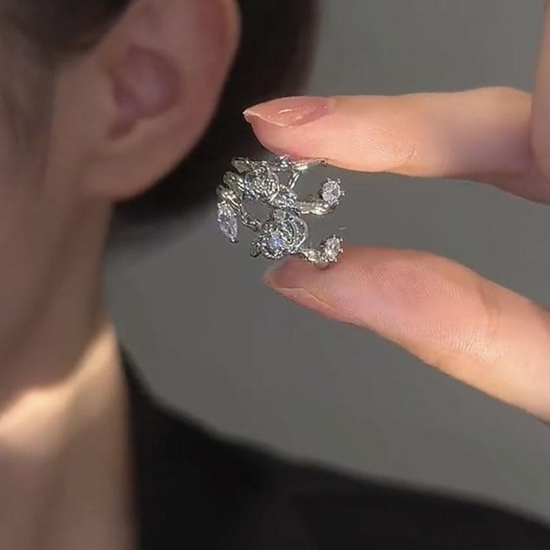 Zircon flower three-layer fashionable earrings, earrings, individual cold wind, no earrings, earbone clips, niche high-end earrings.