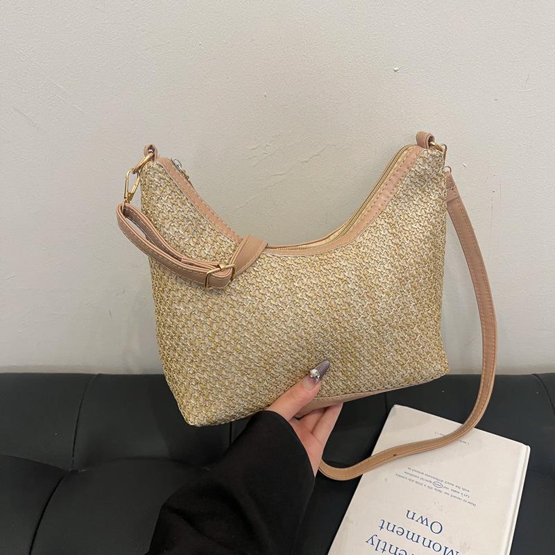 

Fashion casual large capacity straw bag 2025 new woven commuter retro niche single shoulder underarm tote bag хакі