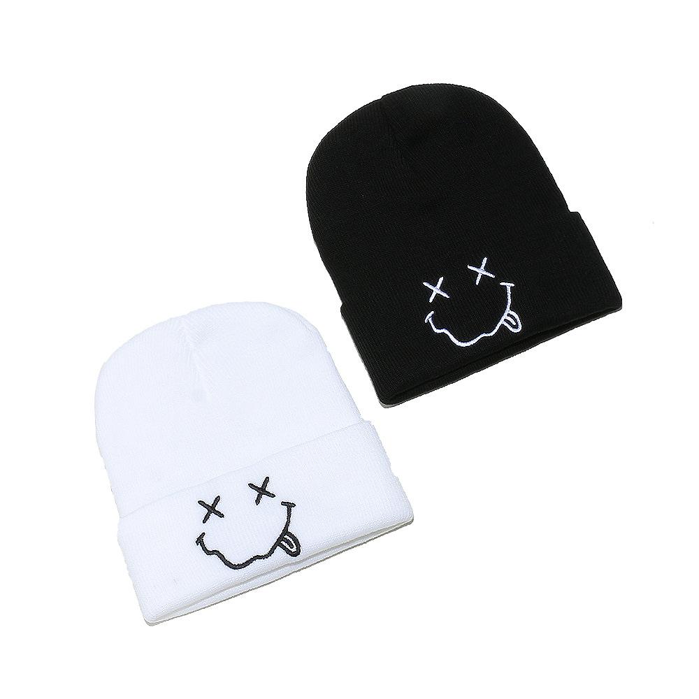 Korean version of embroidery cartoon funny smiley face knitted hat women's autumn and winter outdoor warm cold hat fashion wool hat
