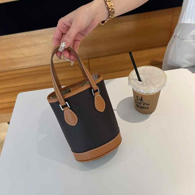 

2025 Новая женская сумка из натуральной кожи, кожаный чехол для головы, вертикальная сумка-ведро, ручная сумка через плечо на одно плечо 18x13x9CM