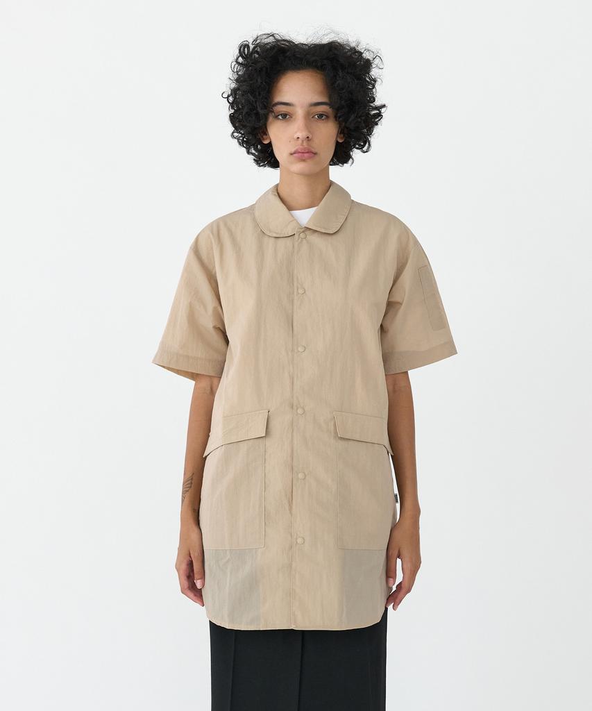 Wokeuwokeu Round Apron Shirt (Beige)