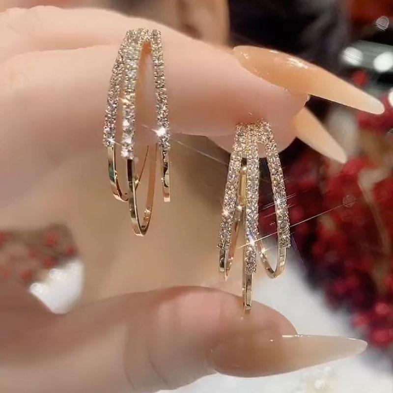 New Women s Light Luxury C-shaped Three Life Three Year Earrings Fashionable Exaggerated Atmospheric Circle High End Earrings