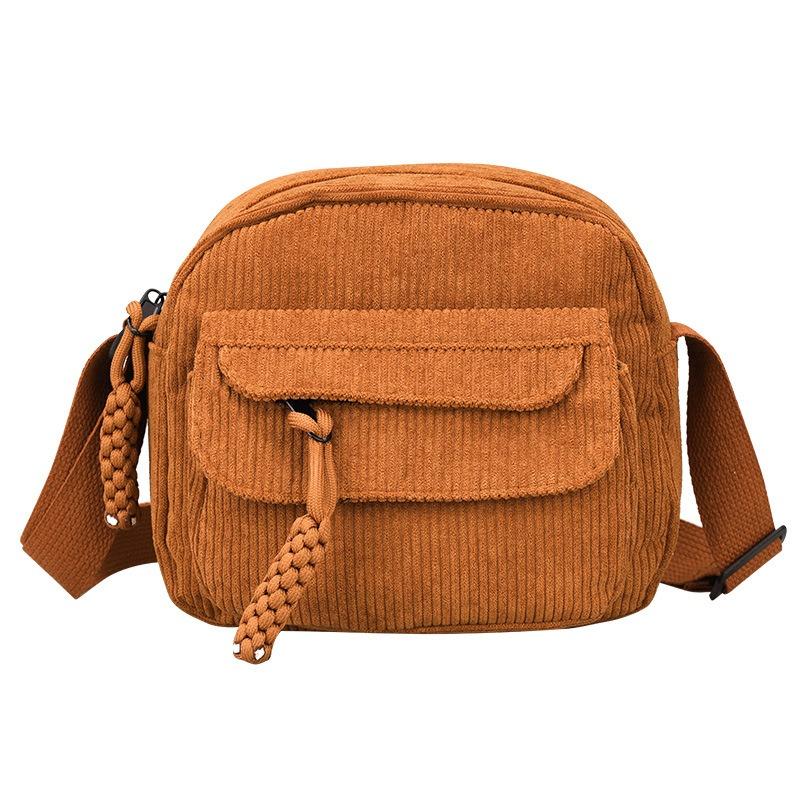 Hot-selling products, striped velvet shoulder messenger bag, corduroy small backpack, men's and women's trendy bags are versatile.