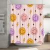 waterproof shower curtainfeaturing a playful smiley face design in pink, yellow, purple, and gold perfect for bath