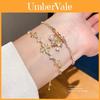 Erforderliches Zirkon Iris Kreuz Armband Mode Gold Damen Schmuck Zum Verschenken