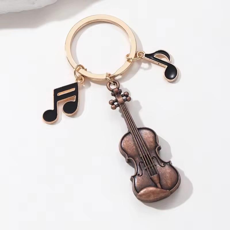 1 Stück Musikinstrument Musik Schlüsselanhänger Klassische Geige Noten Emaille Schlüsselanhänger Gutes Geschenk für Freunde Musiker Handgefertigter Schmuck