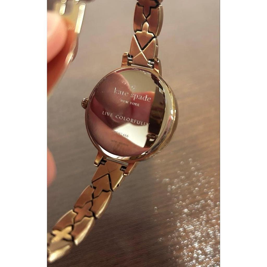 Used Beautiful condition Kate Spade watch, shell dial, gold, battery dead