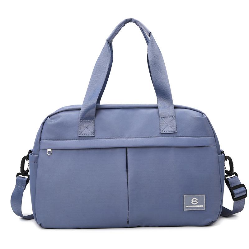 Short trip bag Women's large-capacity fitness bag Storage bag Business trip portable bag Waterproof luggage bag