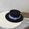 Summer decorative flat-top straw hat women's travel seaside vacation sunshade top hat temperament elegant sunscreen sun hat