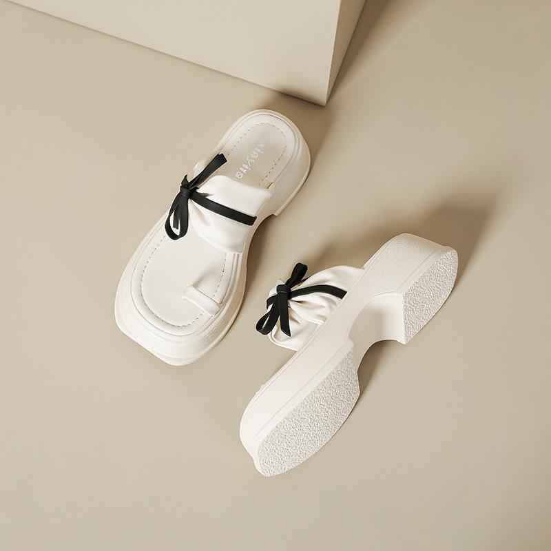 Retro thick-bottomed cool slippers wear summer new fashion bow one-word drag fairy wind cover toe Roman slippers girl
