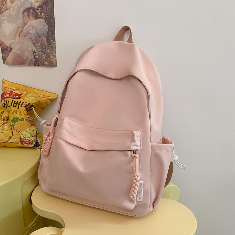 

Stylish new solid color simple small fresh backpack, high value large capacity shoulder pads to reduce burden ultra light schoolbag Single Pack