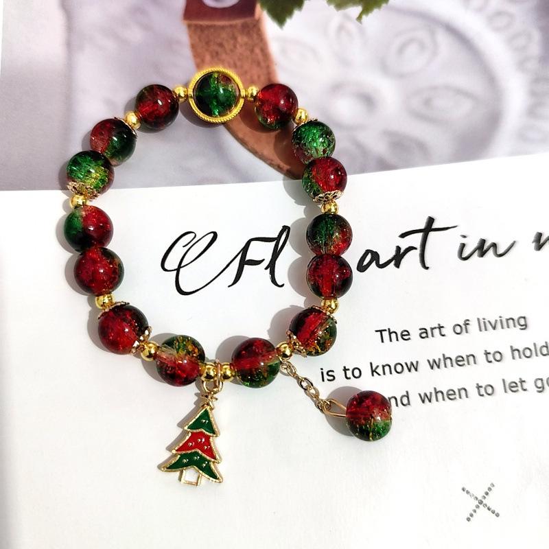 Temu Weihnachtsarmband mit Knisterperlen und Schneeflocken-, Baum-, Weihnachtsmann-, Glockenanhängern