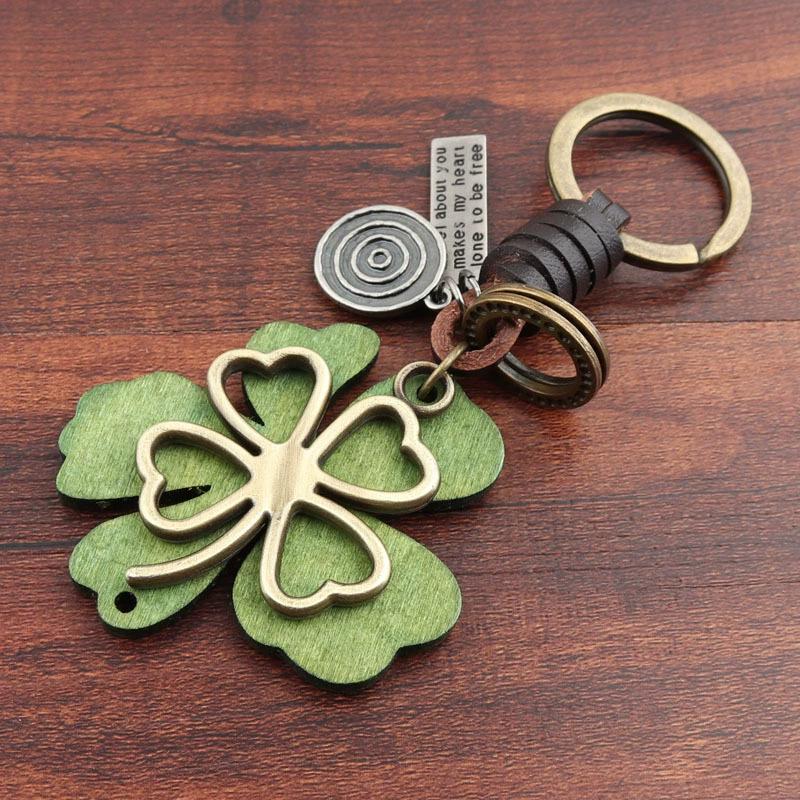 

Alloy Four Leaf Clover Keychain with Wooden Clover Pendant and Metal Rings Leather Strap Car Key Holder Accessory for Men Women