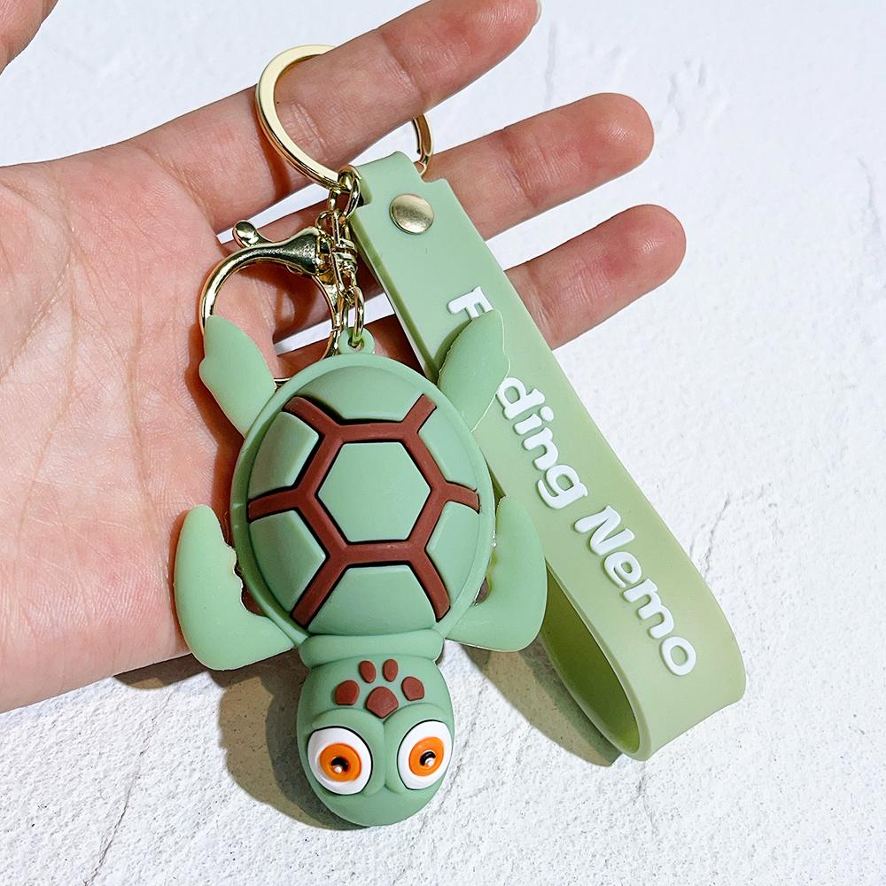 Llavero de Personalidad de Buscando a Nemo Dibujo Animado Pez Feo Nemo Dory Llavero Colgante Encanto para Bolso Accesorios para Llaves de Coche Juguetes Regalos