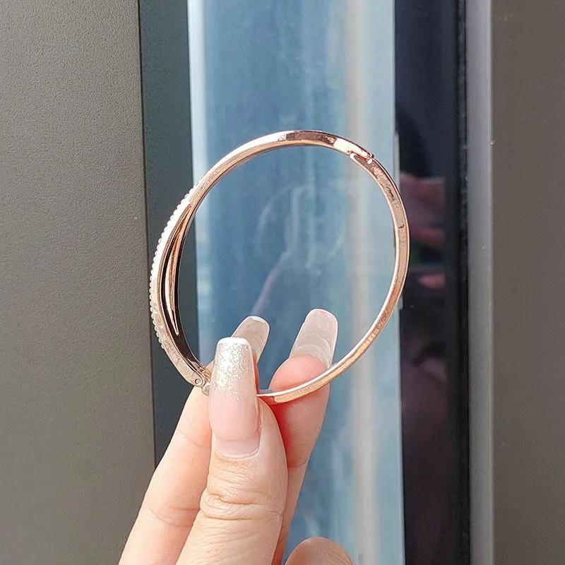 Elegant Crossed Bangle Bracelet with Roman Numeral Engraving and Embedded Rhinestones for Women Fashion Jewelry Accessory