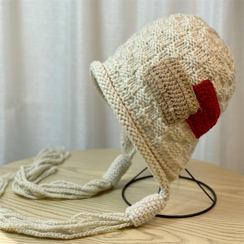 Trendige Damen-Wintermützen, modische neue handgestrickte Wintermützen mit Quasten, stilvolle Winterstrickwaren