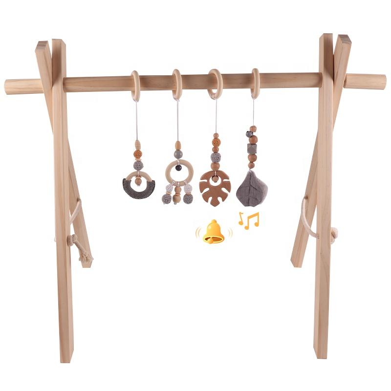 China Manufacturer Exquisite Color Leaf Four-piece Fitness Rack Pendant Wooden Baby Play Activity Gym