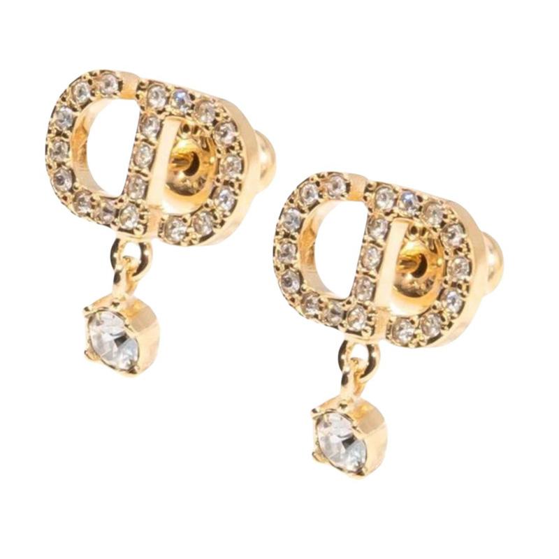 Dior Metallohrringe mit Edelsteindekoration Damenohrringe Gold E3365WOMCYD03S