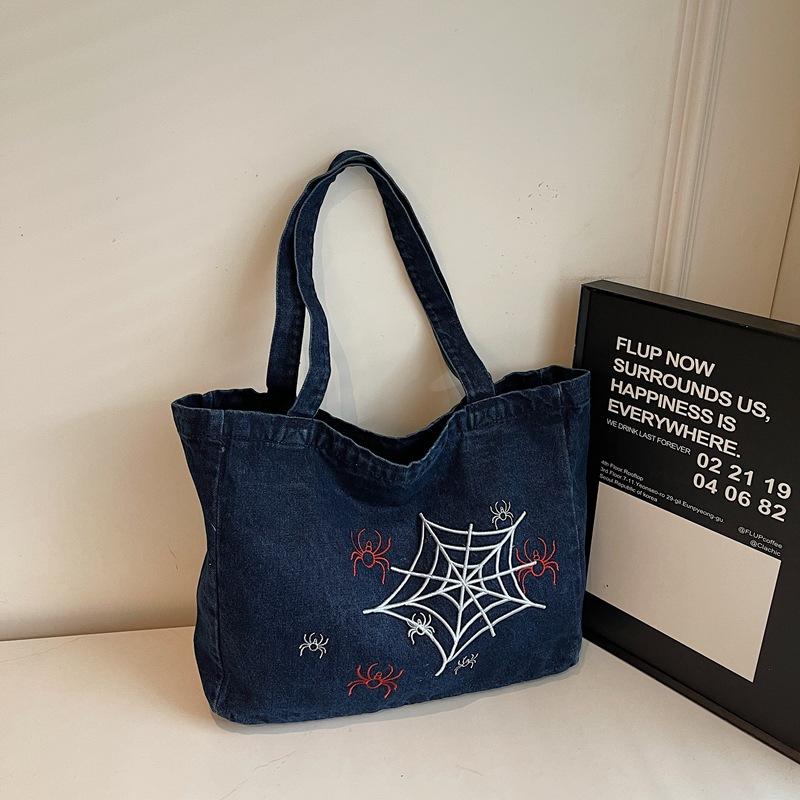 

Niche design embroidered zipper denim bag large capacity commuter versatile tote bag student class shoulder bag tide темно-синього кольору