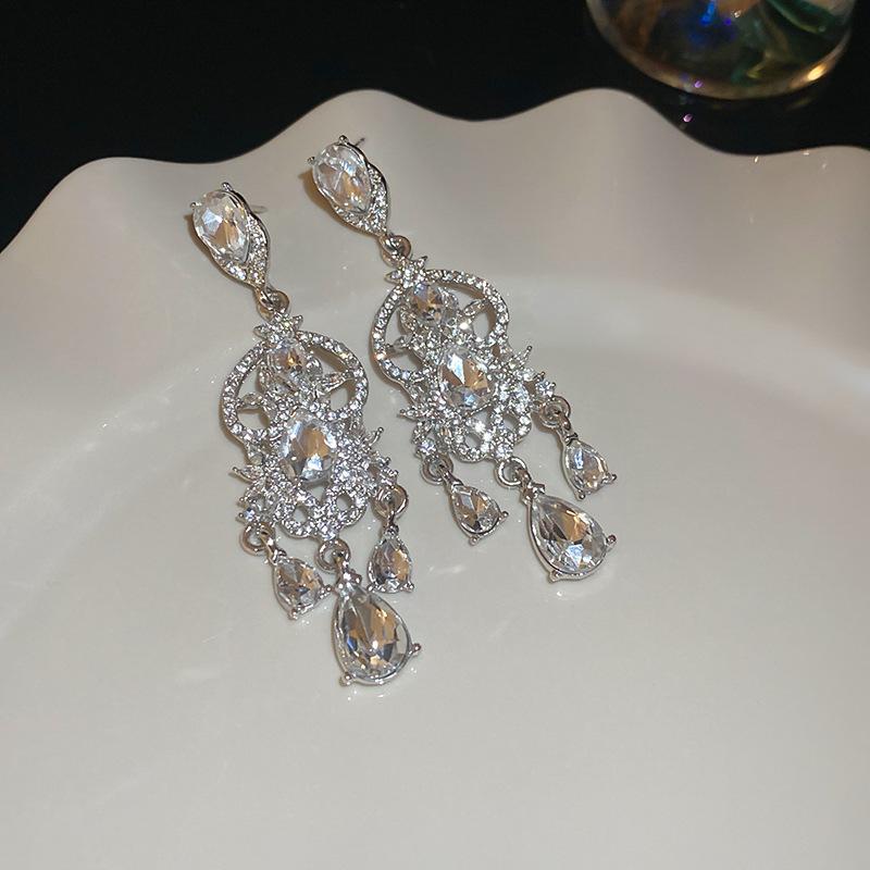 Silver Needle Water Drop Tassel Earrings - Light Luxury High-End Design for Women's Fashion.