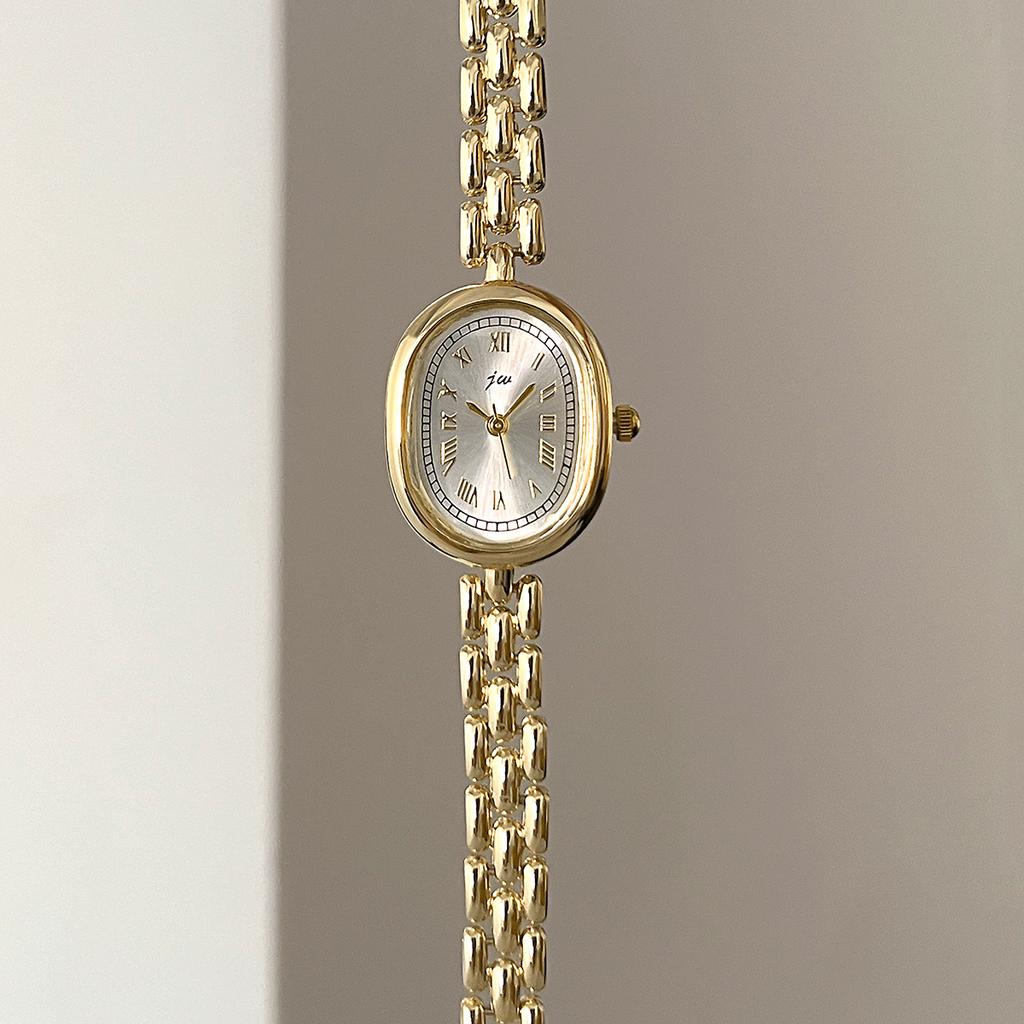 Authentic Jingwei Oval Vintage Women's Quartz Watch with Retro Roman Alloy Bracelet