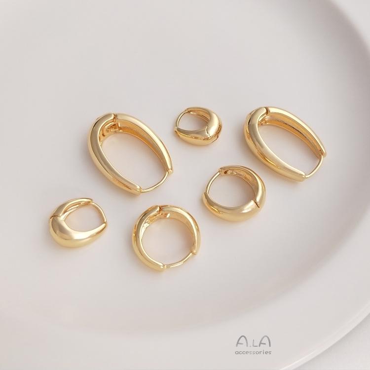 Nausznice w kształcie łezki wypełnione 14-karatowym złotem: Eleganckie, zachowujące kolor kolczyki damskie o luksusowym, prostym i modnym designie.