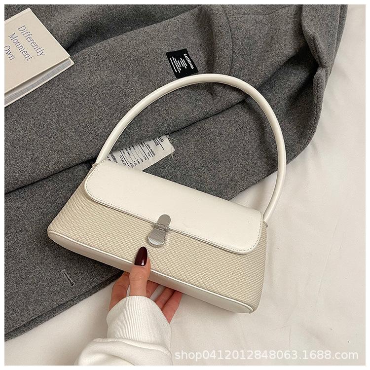 

French niche small bag women s bag 2025 new trendy fashion high sense foreign simple shoulder underarm baguette bag білий