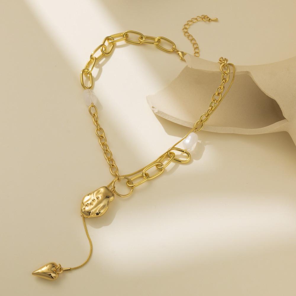 Long Tassel Eyecatching Heart Shaped Pendant Necklace For Women In Gold Elegant