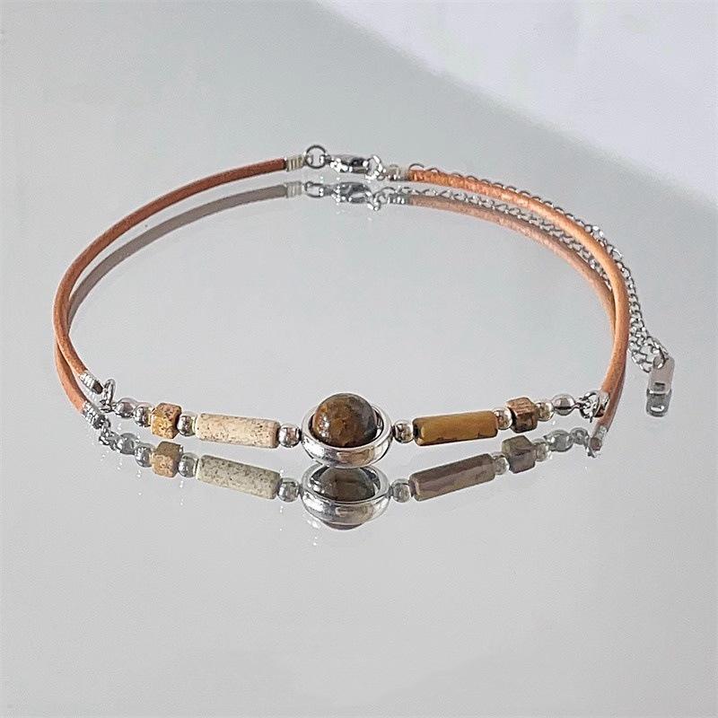 Women's Leather Tiger Eye Layered Necklace - Retro Double-Layer Choker Accessory with High-End Luxury Clavicle Chain.