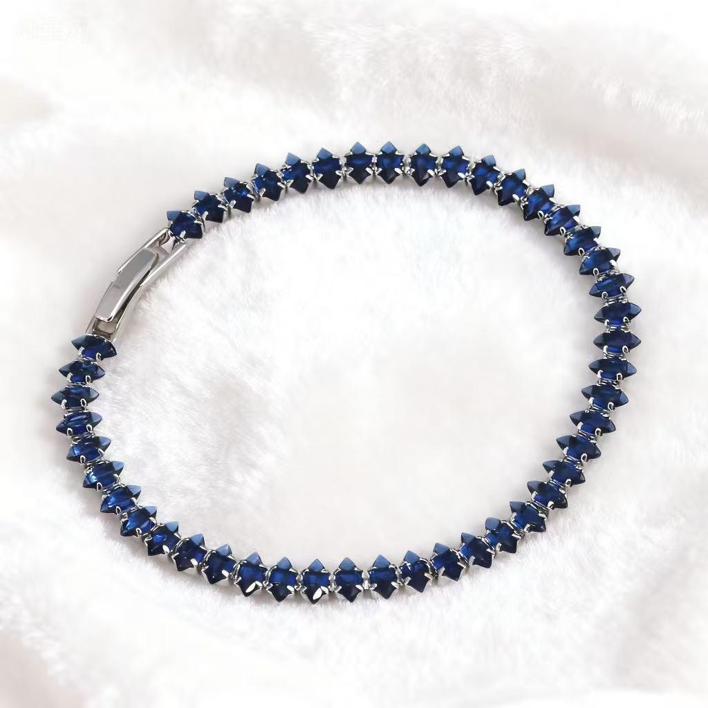 

Elegant Copper Horseshoe Bracelet with Zircon Crystals and Diamond Inlays
