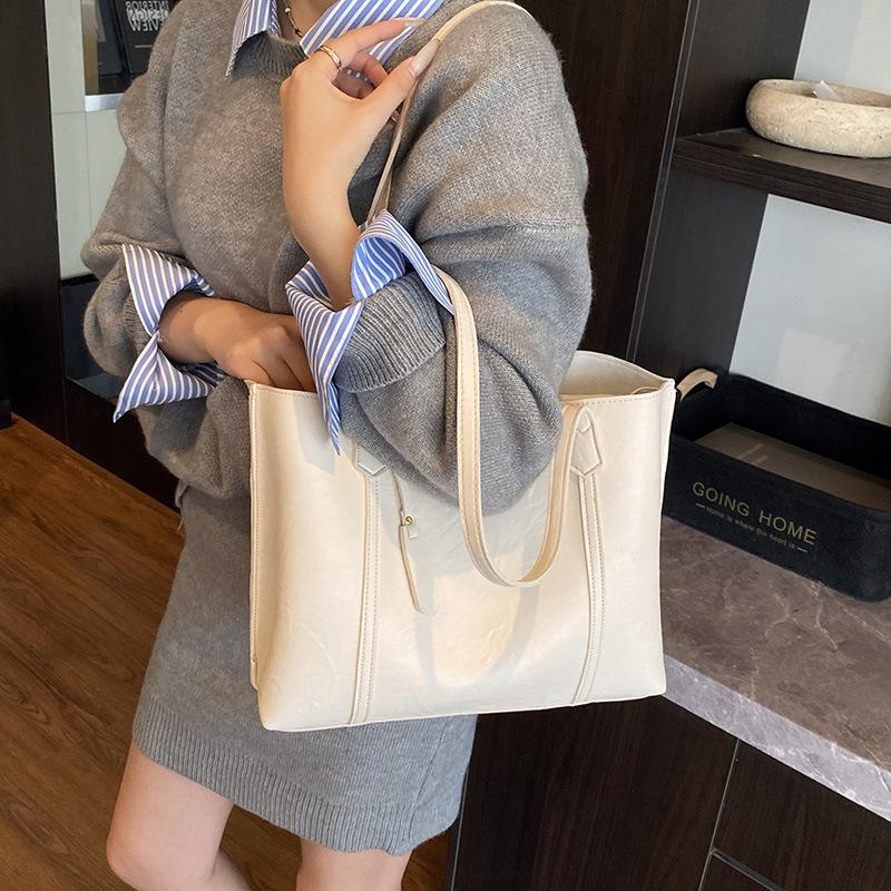 

Ретро сумка-тоут для通勤 женская 2025 новая модная повседневная портативная сумка на плечо нишевая большая вместимость подмышечная сумка белый