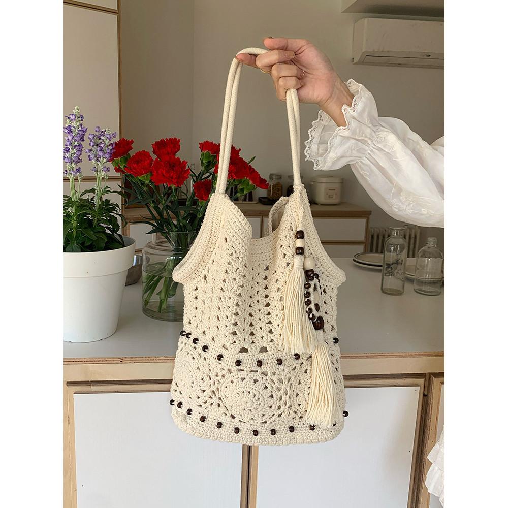 IELGY Wooden Beads Tassel Shoulder Vacation Woven Bag Hollow Straw Beach Bag