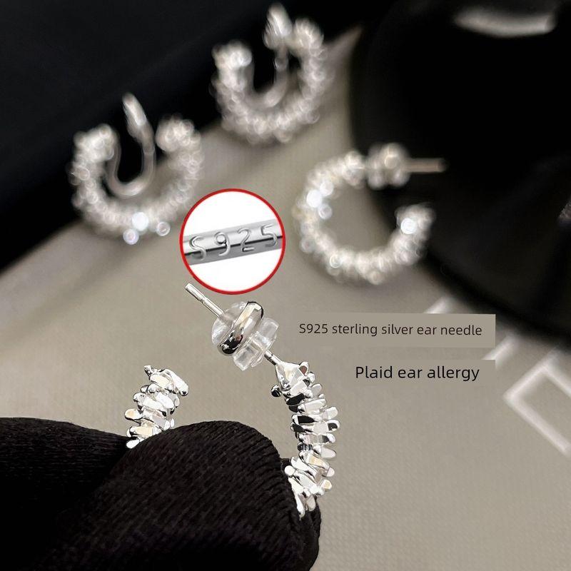 

Cold Wind Small Pieces of Silver Metal Mosquito Coil Simple Earrings Light 925 silver needle(There are ear holes)