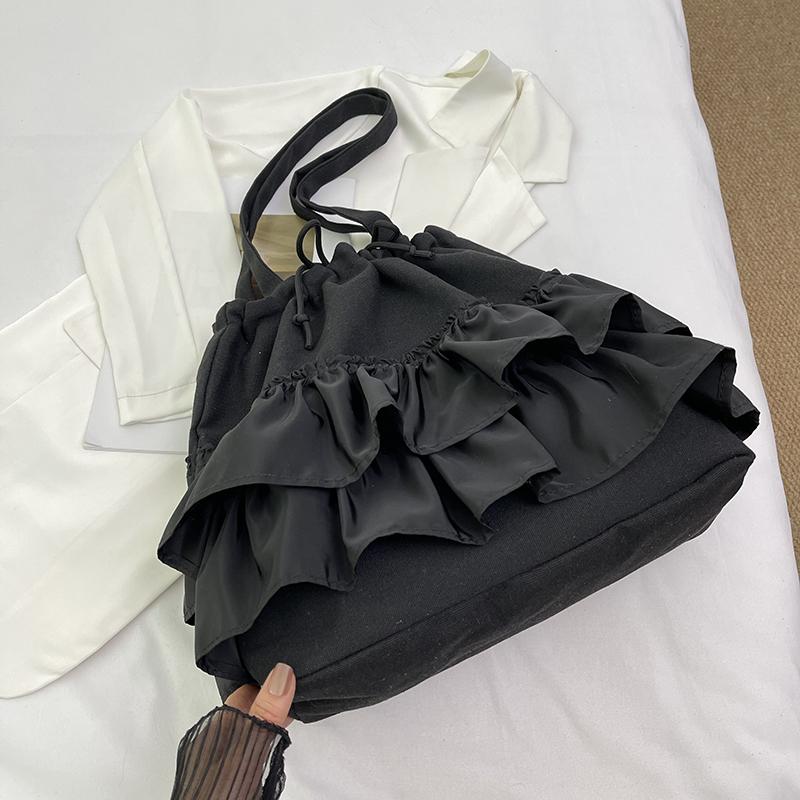2026 New Fresh Style Canvas Women's Bag with Cake Skirt Design Casual Single Shoulder Princess Skirt Cloth Bag Fashionable