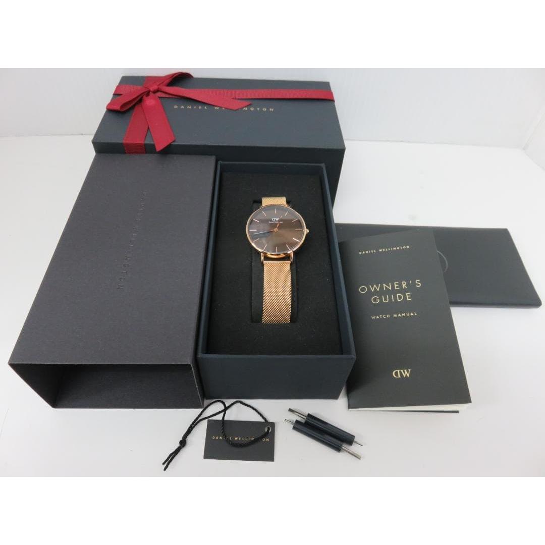 Used Daniel Wellington DW Petite Amber 32mm watch working item