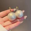 Hong Kong style elegant temperament pearl earrings women's ear buckle type niche unique design earrings European and American cold wind earrings