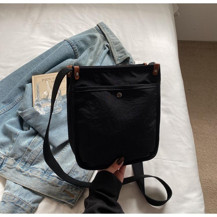 

Canvas bag women s large capacity 2025 summer new simple shoulder messenger bag casual fashion trend mobile phone bag