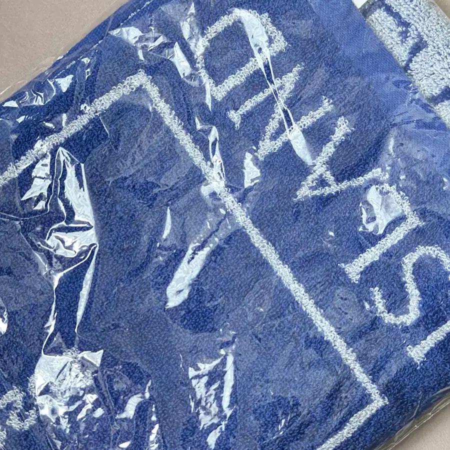 LUCY Japan Limited Towel Slogan sealed
