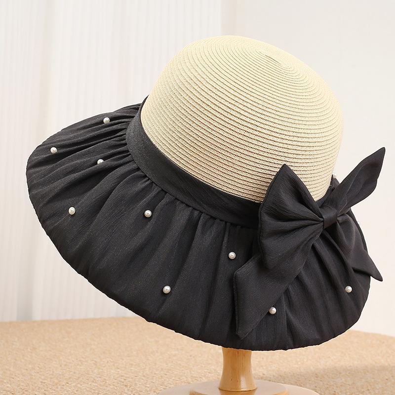 Spring and summer new women's straw hat big brim sun hat French pearl bow versatile sun protection hat travel