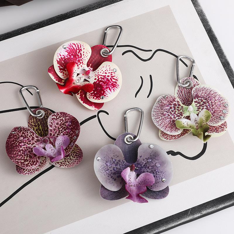 Nádherná klíčenka s orchidejí Phalaenopsis Kreativní přívěsek se simulovanou květinou Dekorace na batoh Dárky