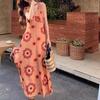 French Retro Style Orange V-neck Printed Suspender Dress for Women's Summer New Vacation Super Good-looking Temperament A-shaped Long Dress