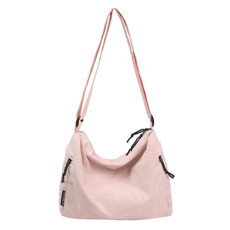 Crossbody bag New couple casual mailman bag Large capacity short trip bag Sports shoulder bag