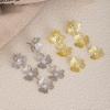 Gold Hollow Diamond-Encrusted Clover Fringed Earrings, High-End Light Luxury, Niche Fashion, Elegant And Exquisite Atmospheric Earrings