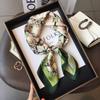 High-End Women's Lightweight Silk Square Scarf - Temperament Print Neckerchief for Neck Protection and Decoration.
