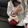Niche design bow handbag new sense contrasting color small round bag fashionable versatile high value women