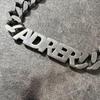Used ADRER- logo necklace- logo necklace