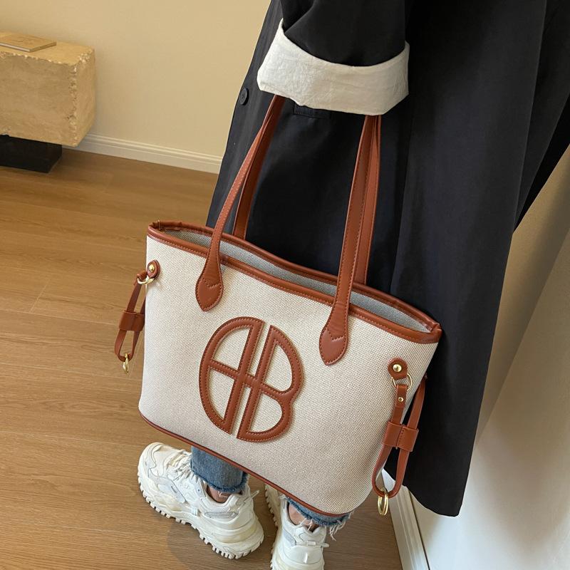 Geantă de damă din pânză de capacitate mare 2025 nouă geantă tote de umăr casual versatilă geantă de mână pentru navetă de lucru