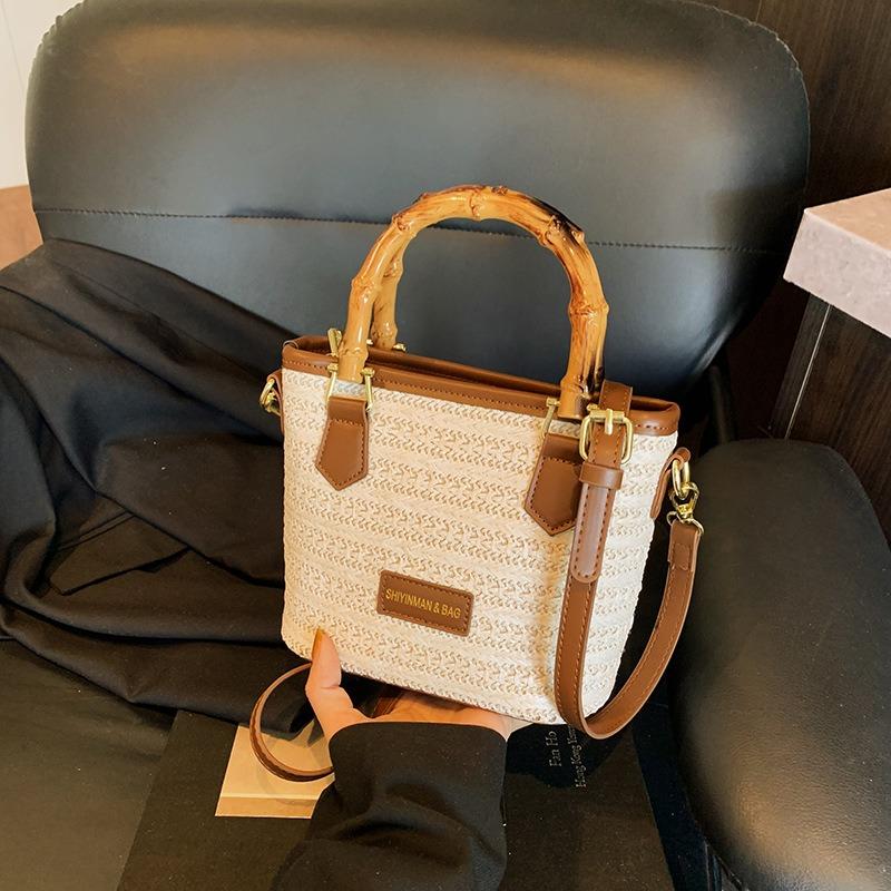 Gewebte Stroh-Eimer-Tasche Damen neue Mode Umhängetasche tragbare kleine Tasche
